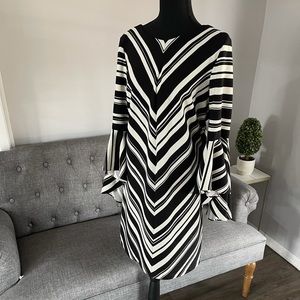 Cream and black pullover dress with bell sleeves